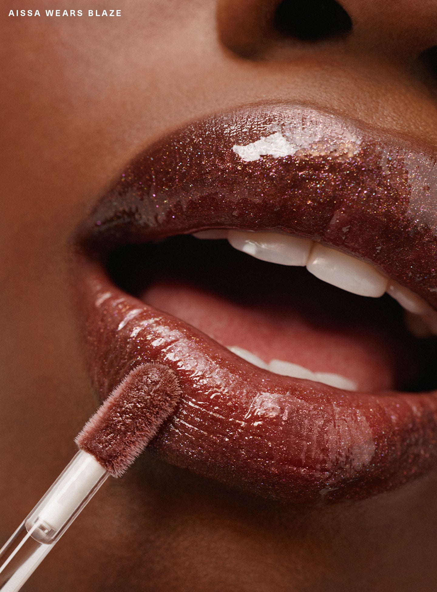 CAMPAIGN-CANDIDS-AISSA-PL-LUMINIZING-LIP-GLOSS-BLAZE-02-1