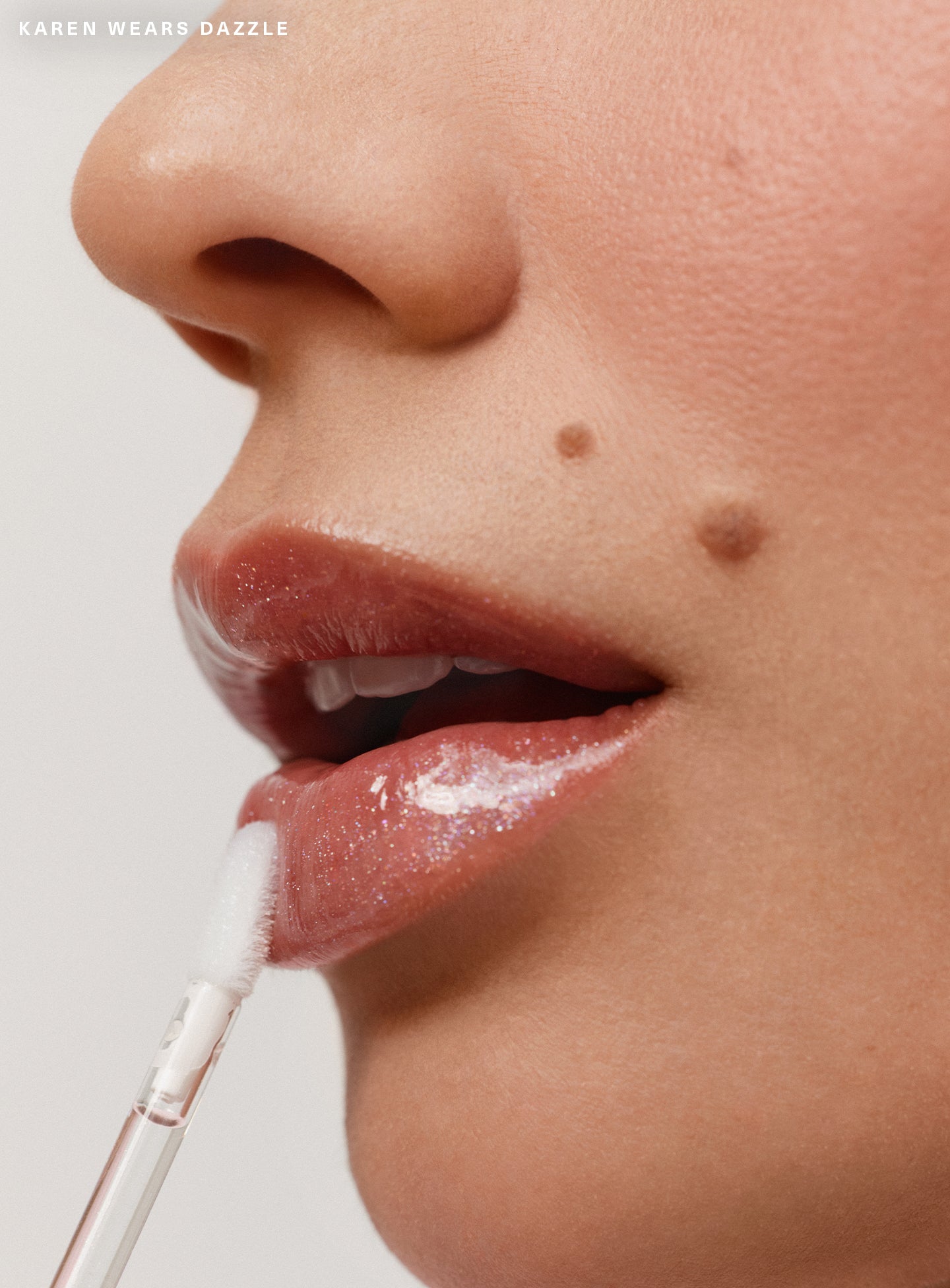 CAMPAIGN-CANDIDS-KAREN-PL-LUMINIZING-LIP-GLOSS-DAZZLE-02-1