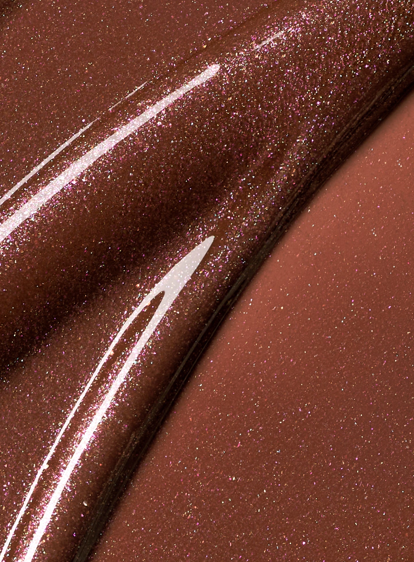 PL-LUMINIZING-LIP-GLOSS-SWATCH-BLAZE-1