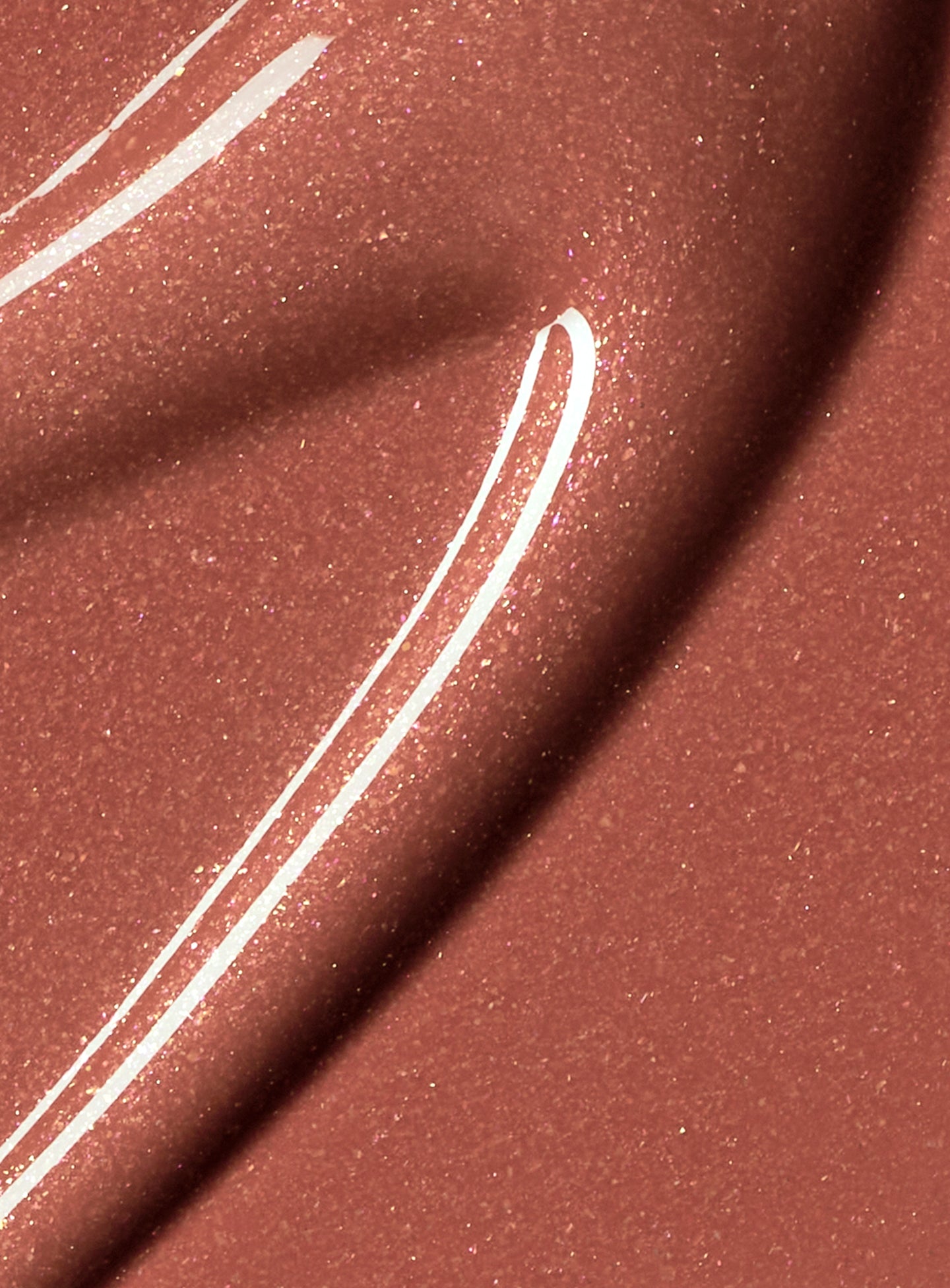 PL-LUMINIZING-LIP-GLOSS-SWATCH-SPARK-1